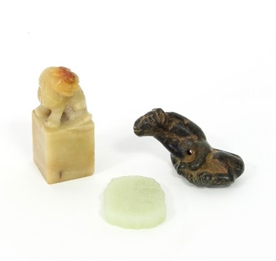 Lot 170 - A Chinese carved jade pendant, with character...