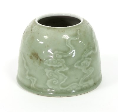 Lot 172 - A Chinese celadon brush pot of tapering form,...