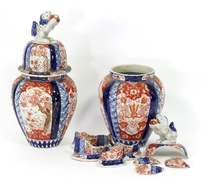 Lot 175 - A pair of Japanese Imari pear shaped vases and...