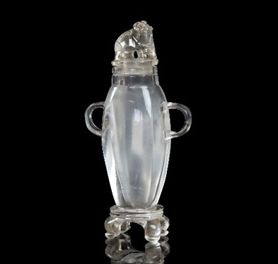 Lot 185 - A Chinese carved rock crystal vase and cover,...