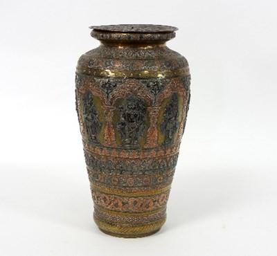 Lot 201 - An Indian brass vase with copper and white...