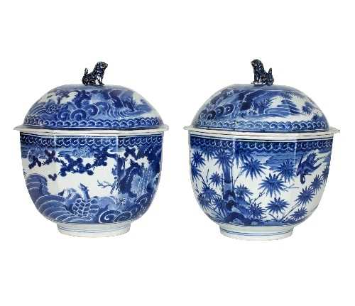 Lot 203 - A pair of Japanese octagonal jars and covers,...