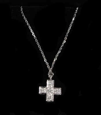 Lot 217 - A diamond cross-shaped pendant set in 18ct...