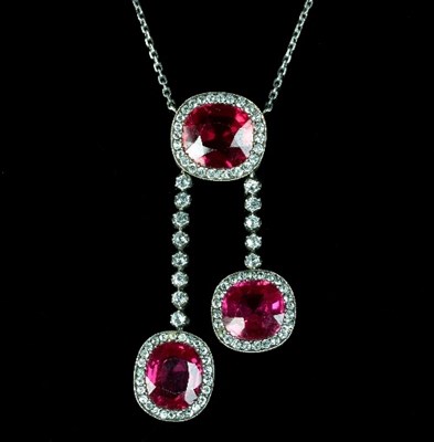 Lot 223 - A paste set negligee pendant, the ruby and...