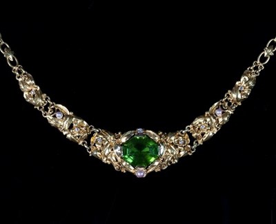 Lot 236 - A peridot, diamond and pearl necklace, the...