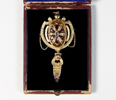 Lot 242 - A Victorian gem set pendant/brooch, of shield...