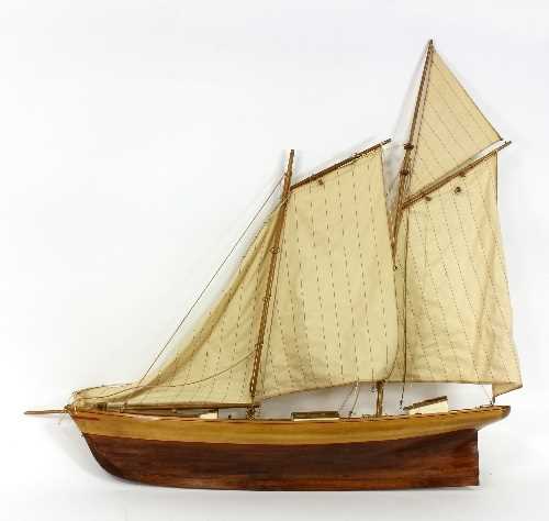 Lot 300 - A model gaff rig schooner complete with