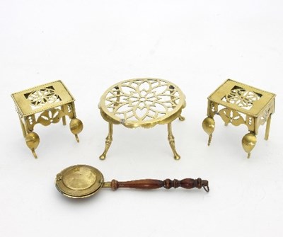 Lot 301 - A pair of Georgian brass miniature footmen,...