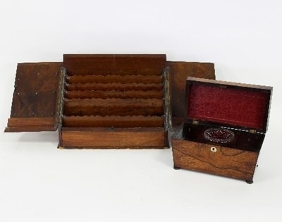 Lot 336 - A Regency rosewood tea caddy of sarcophagus...