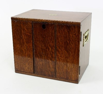 Lot 338 - An early 20th Century oak humidor, fitted two...