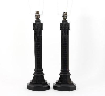 Lot 345 - A pair of ebonised lamp bases of octagonal...