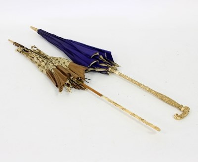 Lot 380 - Two late 19th Century French parasols with...