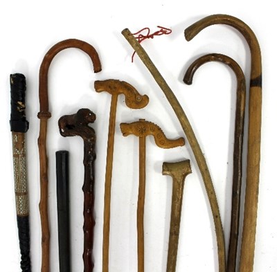 Lot 383 - A large quantity of walking sticks, canes, a...