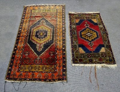 Lot 403 - Two modern Eastern rugs, the largest 185cm x 79cm