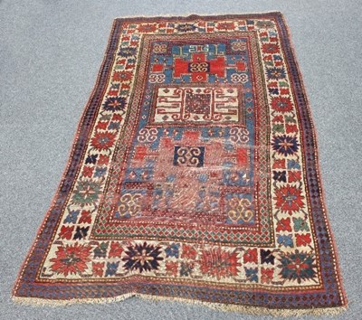 Lot 407 - A Hamadan rug with geometric central blue...