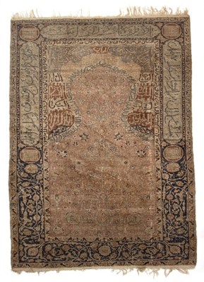 Lot 409 - A Turkish prayer rug, with pink ground central...