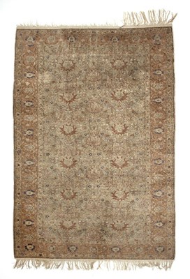 Lot 410 - A Hereke silk rug, the floral and geometric...