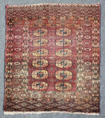 Lot 419 - A small Tabriz rug, two rows of six guls,...