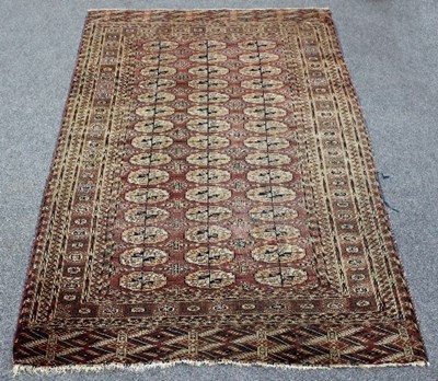 Lot 420 - A Bokhara rug, three rows of fifteen guls,...