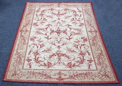 Lot 422 - A Laura Ashley rug of scrolling design within...