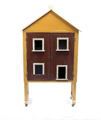 Lot 438 - A painted doll's house on an integral stand...