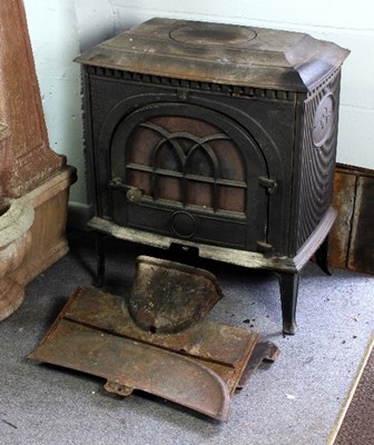 Lot 455 - A rectangular cast iron wood burning stove on...