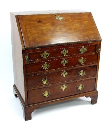 Lot 472 - A George III mahogany bureau fitted four...