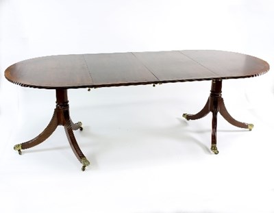 Lot 484 - A mahogany two-pillar dining table, 225cm long