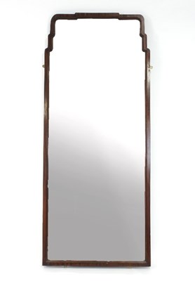 Lot 490 - A mahogany framed wall mirror with bevelled...