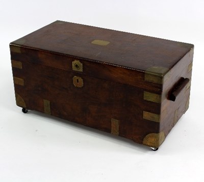 Lot 496 - A walnut and brass bound chest with hinged top,...