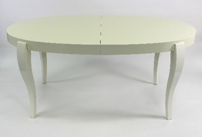 Lot 502 - A contemporary dining table of oval form with...