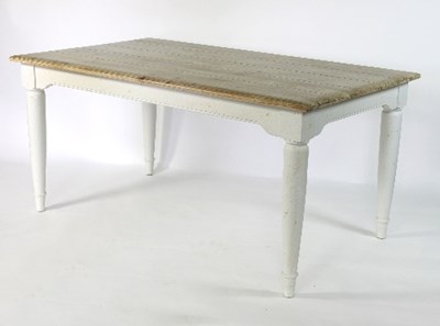 Lot 504 - A pine kitchen table, the base painted white...