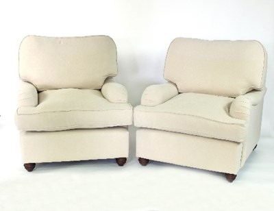 Lot 506 - A pair of contemporary Howard style cream...