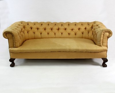 Lot 512 - A Chesterfield button back upholstered sofa...