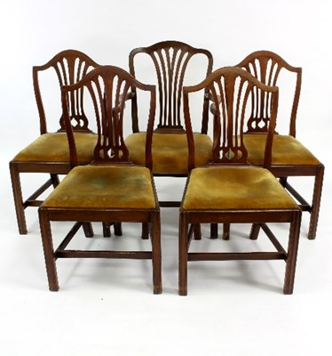 Lot 517 - A set of five mahogany dining chairs, each...