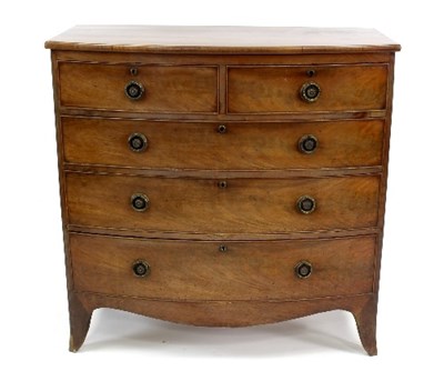 Lot 522 - A mahogany bowfront chest of two short over...