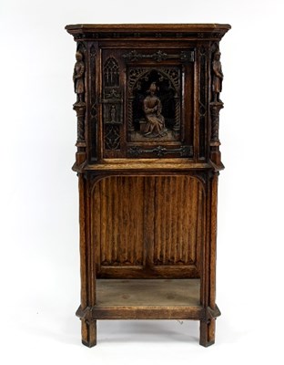 Lot 531 - A Renaissance Revival carved oak cupboard on...