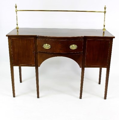 Lot 534 - A mahogany bowfront sideboard, fitted a brass...