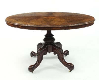 Lot 544 - A Victorian burr walnut loo table, the oval...