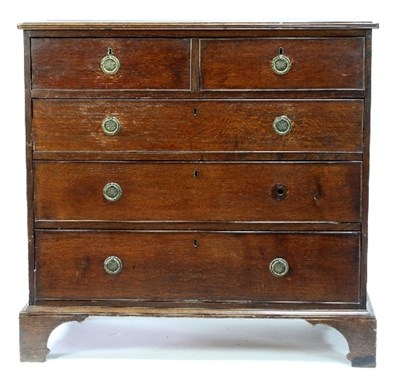 Lot 547 - An oak chest fitted three long and two short...