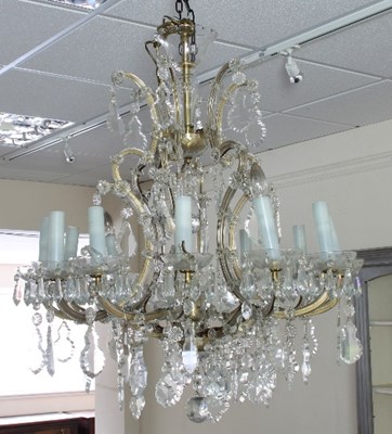 Lot 562 - A twelve-light cut glass chandelier with...