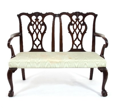 Lot 565 - A mahogany two-chair back settee of 18th...