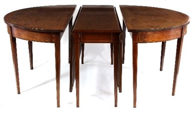 Lot 568 - A George III and later mahogany dining table...