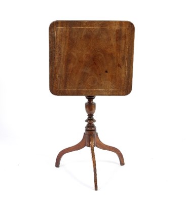 Lot 571 - A George IV mahogany table on a turned column...