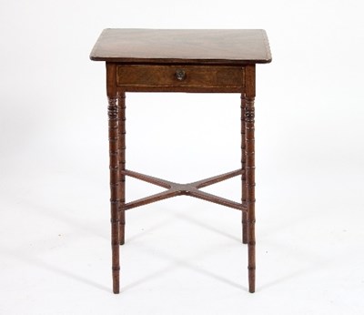 Lot 575 - A Regency mahogany table, banded in tulipwood,...