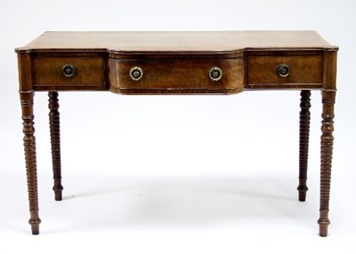 Lot 579 - A Regency mahogany broken D-front side table,...