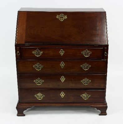 Lot 604 - A George III mahogany bureau with fitted...