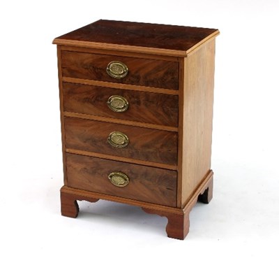 Lot 614 - A small mahogany chest fitted four drawers on...