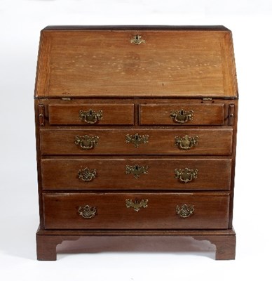 Lot 622 - A George III mahogany bureau, fitted three...