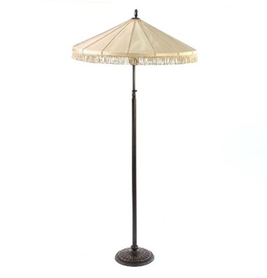 Lot 632 - A bronze metal standard lamp, with adjustable...